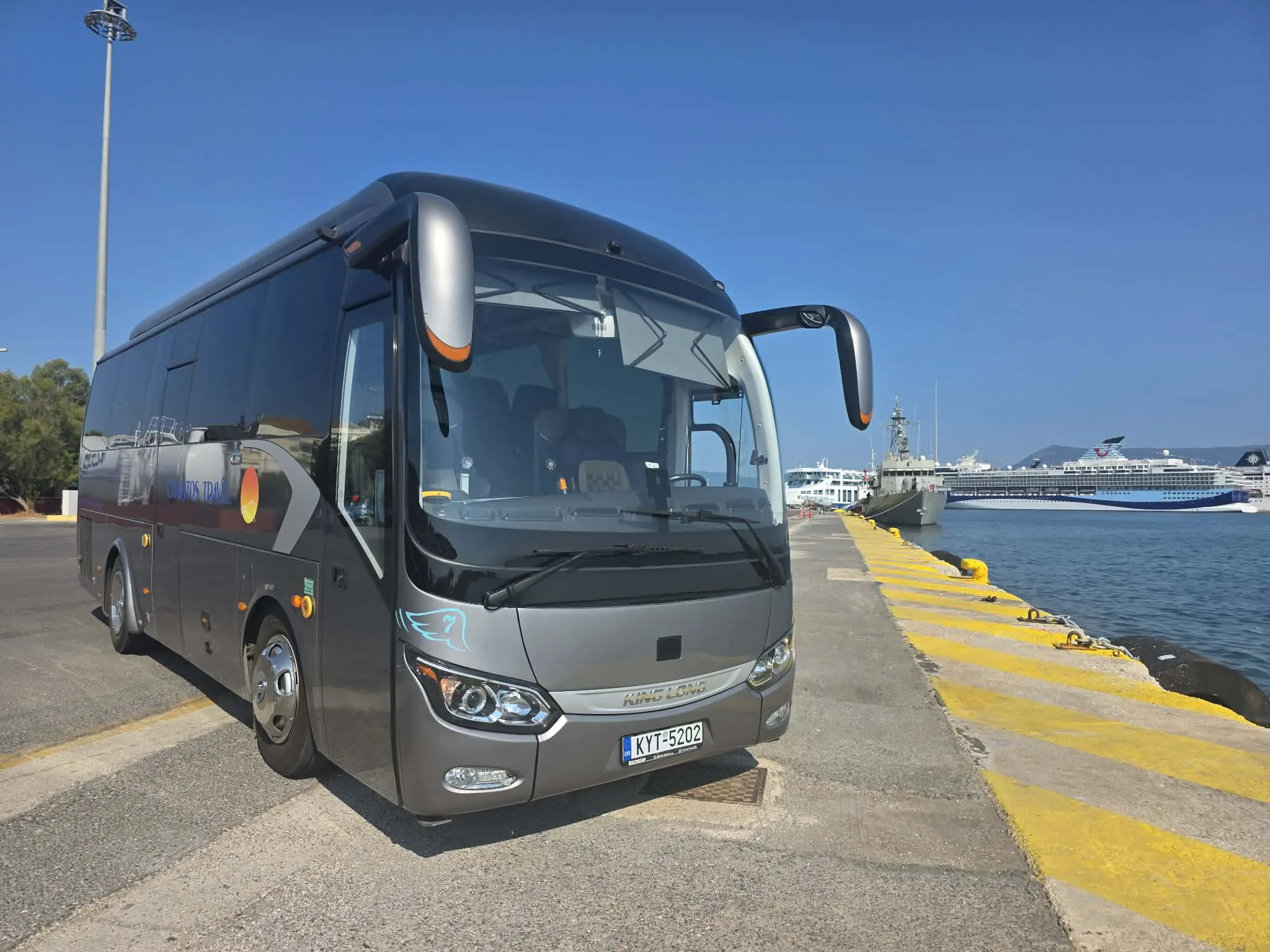 The 35-seat coach on the quay at Corfu port